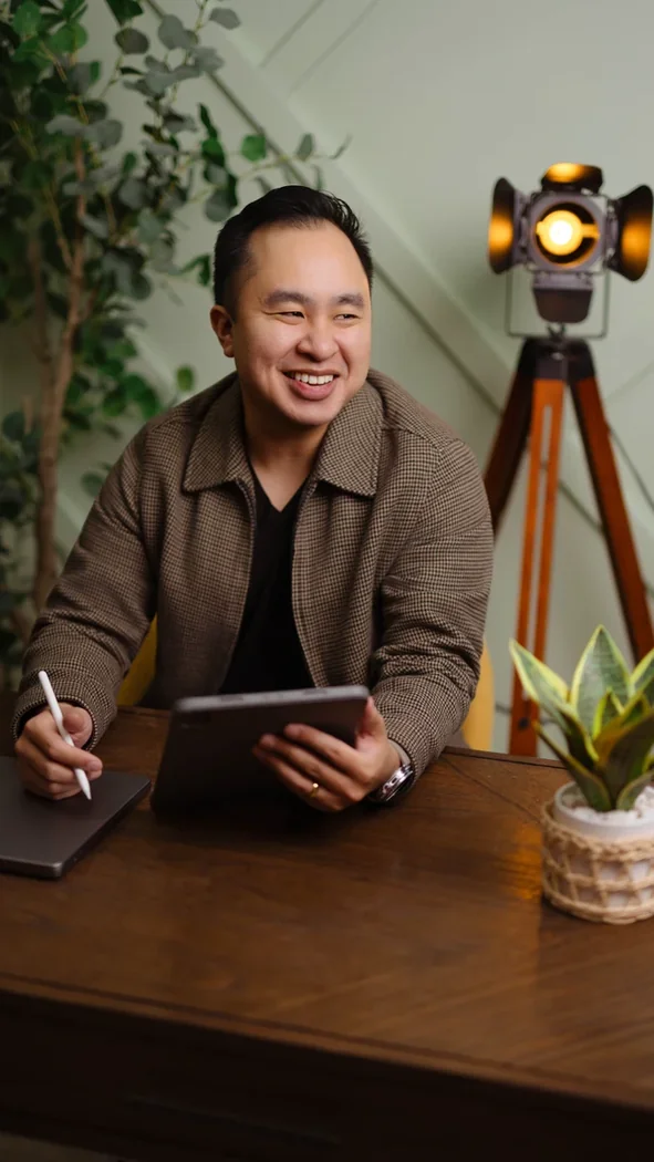 Neill Papa at his desk
